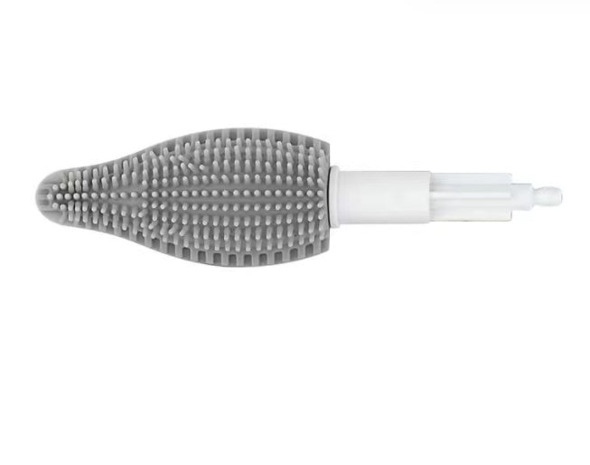 USB Rechargeable Automatic Kitchen Cleaning Brush in use for cleaning a stainless steel bowl with soapy water.