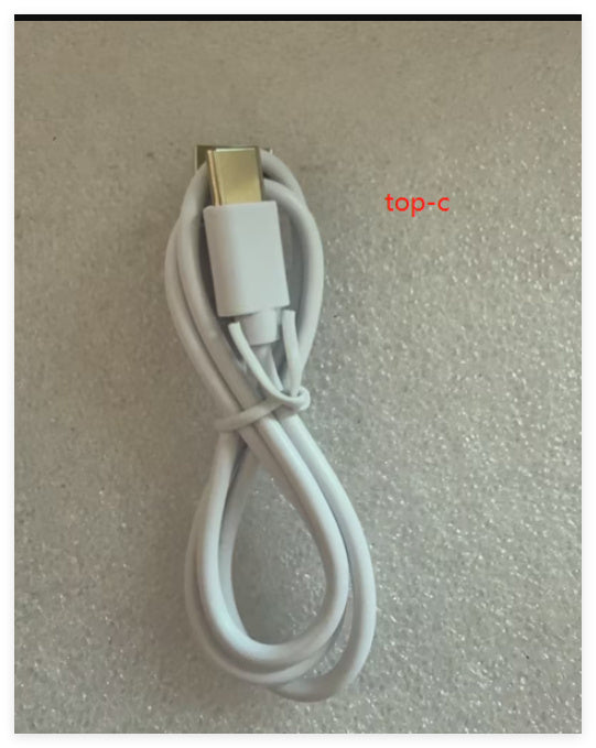 Top-C charging cable in white color, neatly coiled for easy storage and use.